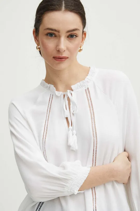 Bluzka damska z asymetrycznym dołem kolor biały Damski