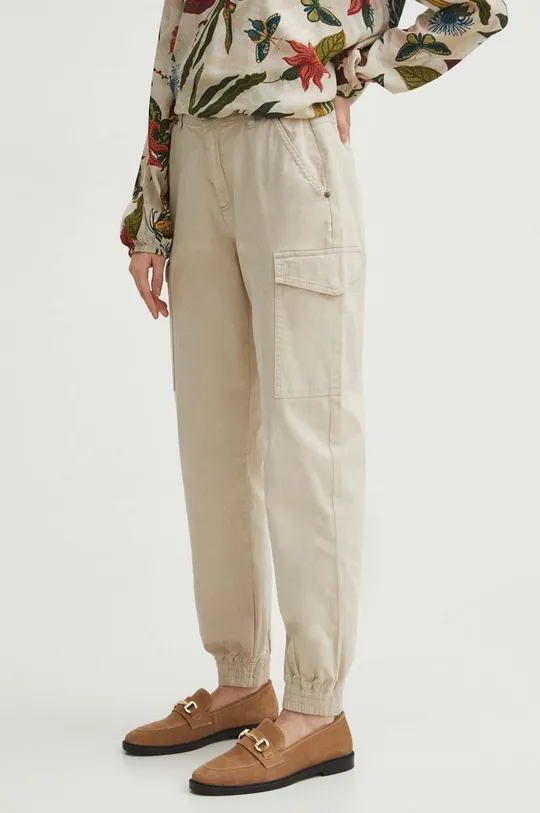 Kalhoty dámské s kapsami cargo béžová barva béžová