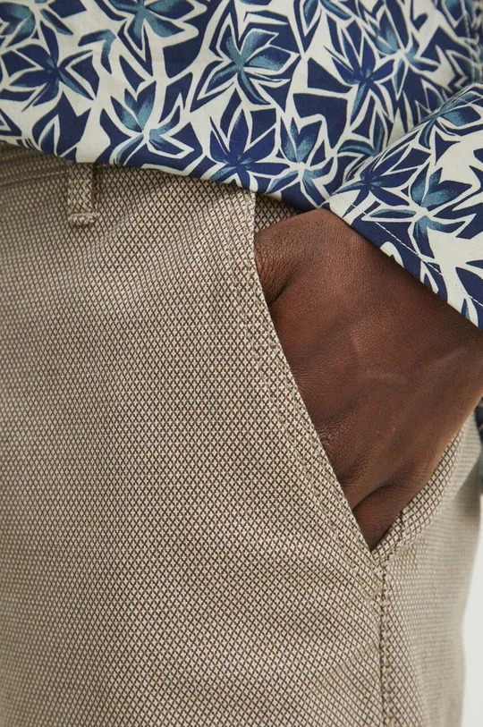 Kalhoty pánské se vzorem béžová barva béžová RS24.SPM032