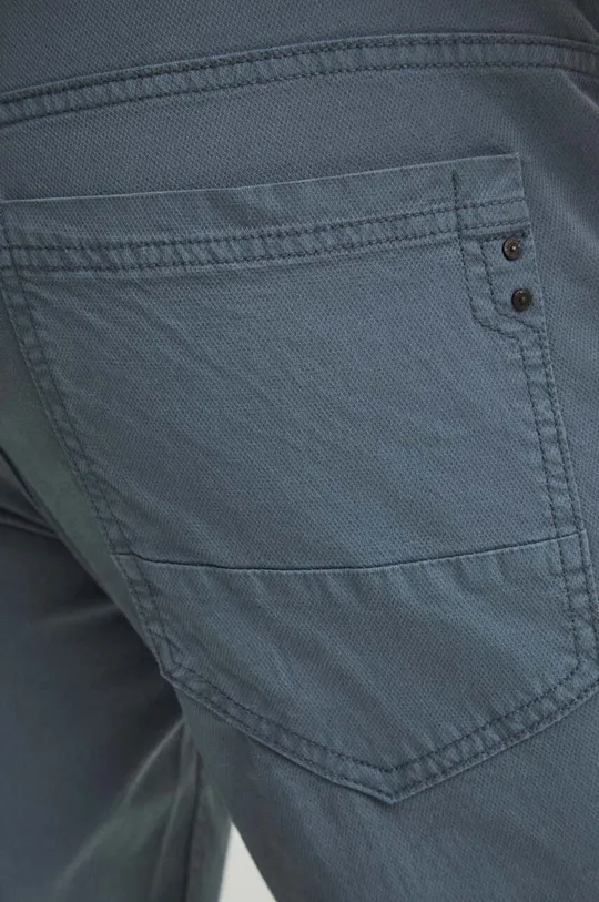 niebieski Spodnie męskie slim kolor niebieski