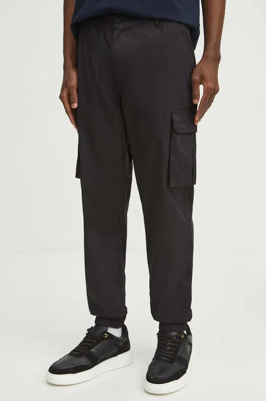 czarny Spodnie męskie gładkie kolor czarny Męski