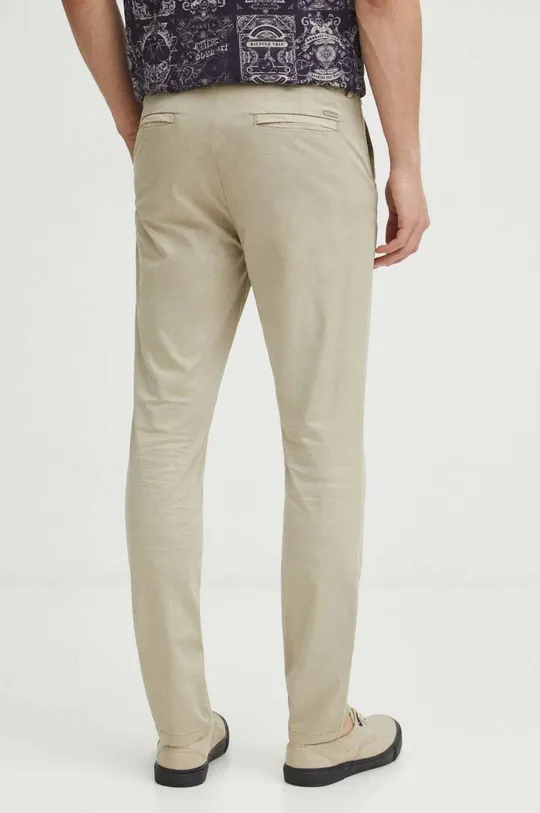 Spodnie męskie slim gładkie kolor beżowy Materiał główny: 98 % Bawełna, 2 % Elastan, Podszewka: 100 % Bawełna, Materiał dodatkowy: 100 % Bawełna