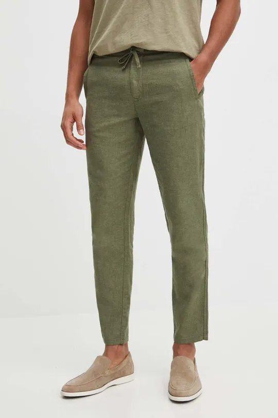 Plátěné kalhoty pánské tapered zelená barva zelená