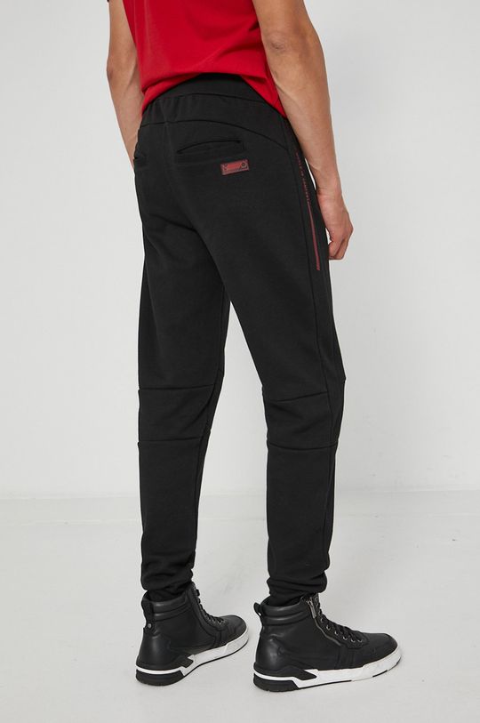 Spodnie dresowe męskie gładkie czarne Materiał zasadniczy: 52 % Bawełna, 48 % Poliester, Inne materiały: 100 % Bawełna