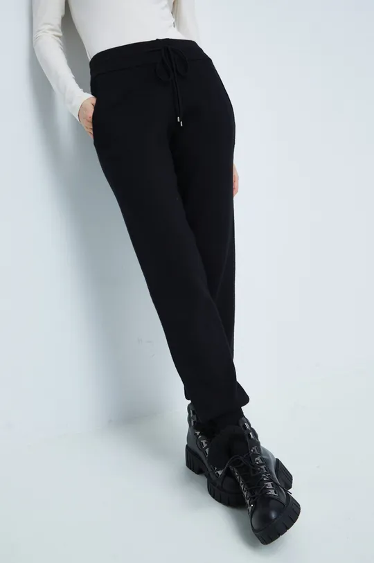 czarny Spodnie dresowe damskie gładkie kolor czarny Damski