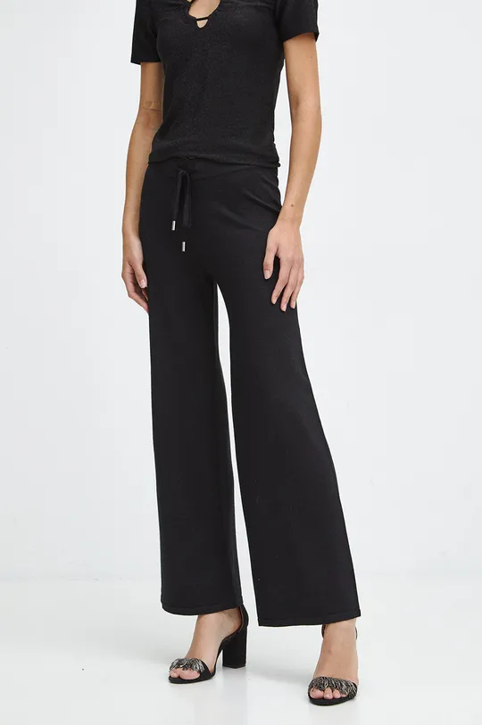 Spodnie damskie z metaliczną nicią kolor czarny czarny