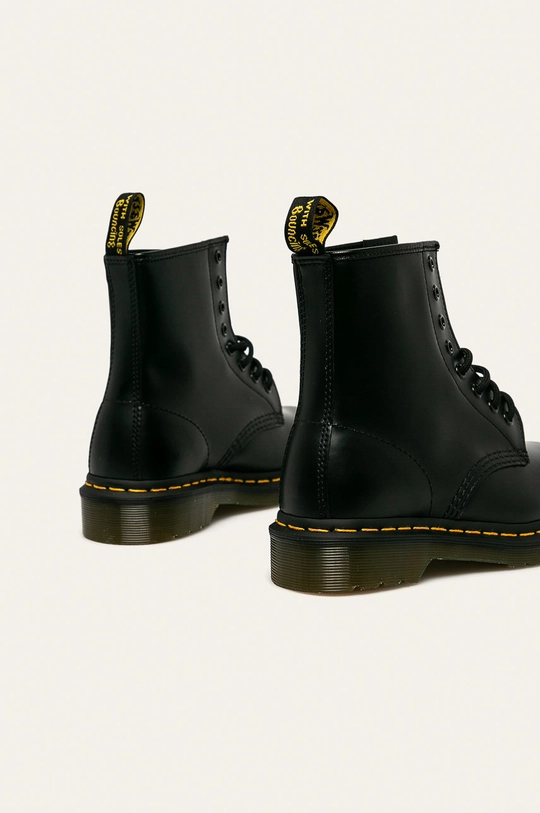 Dr. Martens ankle boots  Uppers: Natural leather Inside: Textile material, Natural leather Outsole: Synthetic material