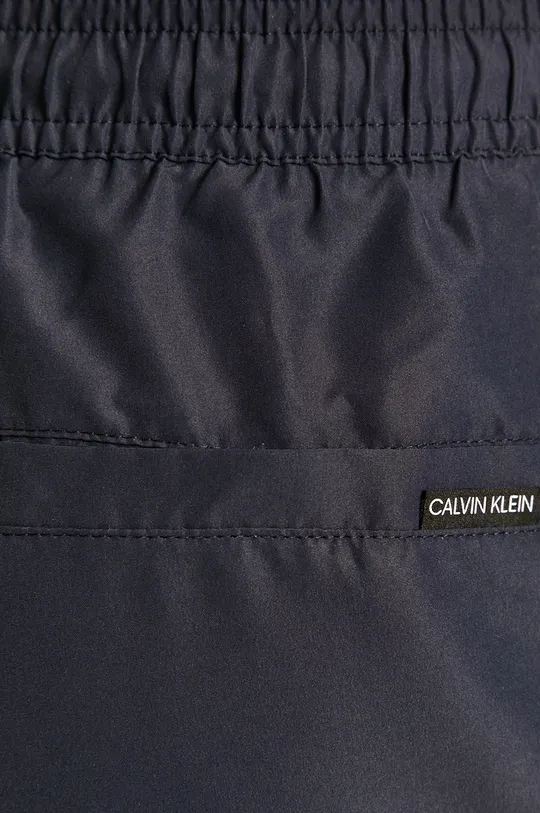 tmavomodrá Calvin Klein Jeans - Plavkové šortky