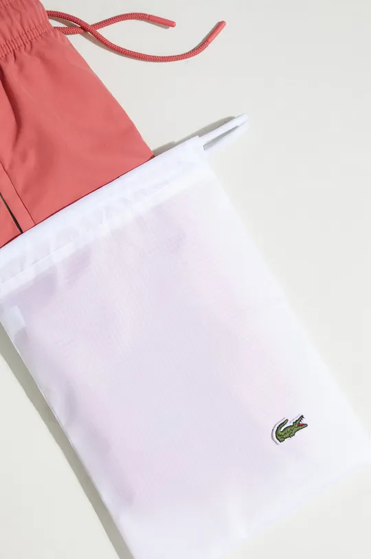 pink Lacoste swim shorts