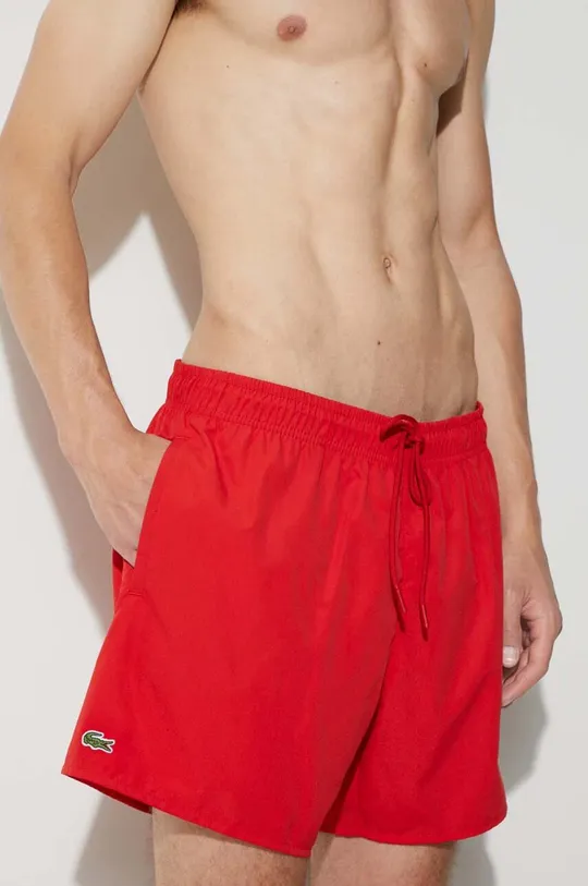 Kopalne kratke hlače Lacoste rdeča