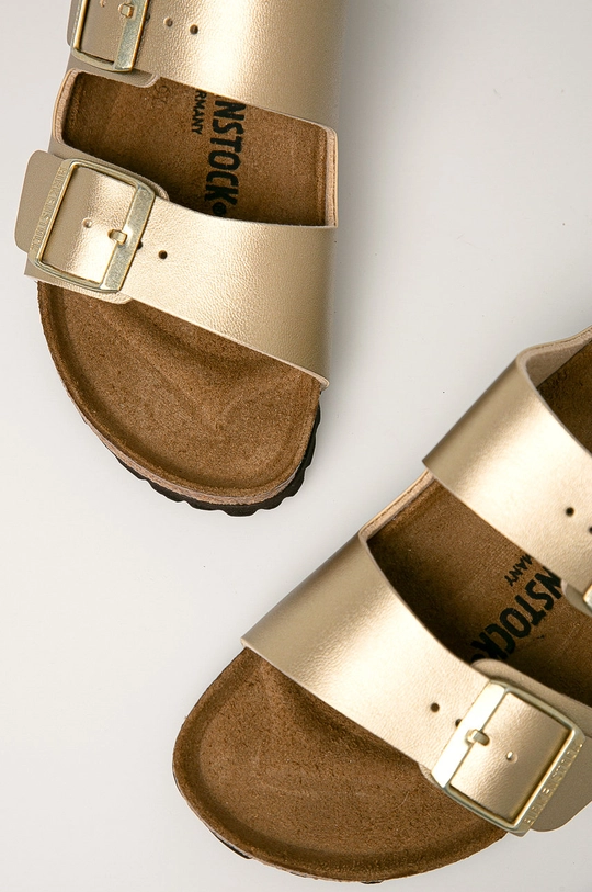 Birkenstock sliders Arizona  Uppers: Synthetic material Inside: Textile material, Natural leather Outsole: Synthetic material