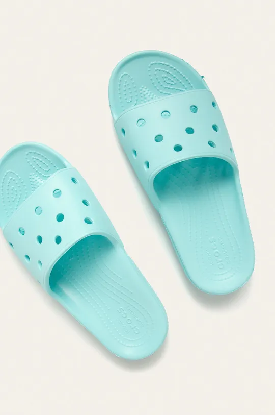 NatikačeClassic Crocs Slide Vanjski dio: Sintetički materijal Unutrašnji dio: Sintetički materijal Potplat: Sintetički materijal