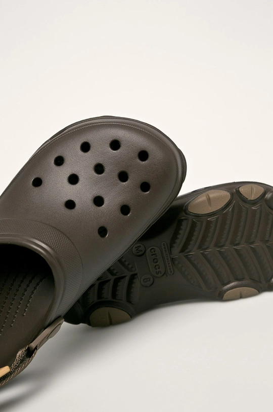 brown Crocs sliders