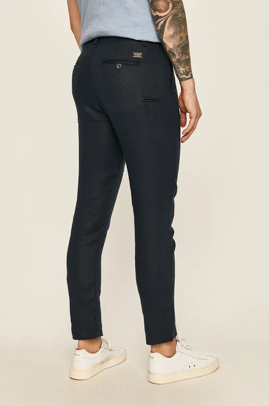 Guess Jeans - Nohavice  Podšívka: 40% Bavlna, 60% Polyester Základná látka: 100% Ľan