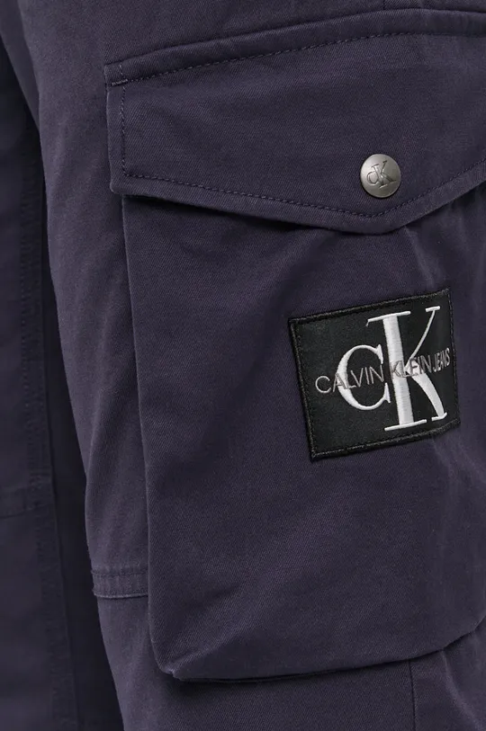 granatowy Calvin Klein Jeans Spodnie J30J314147