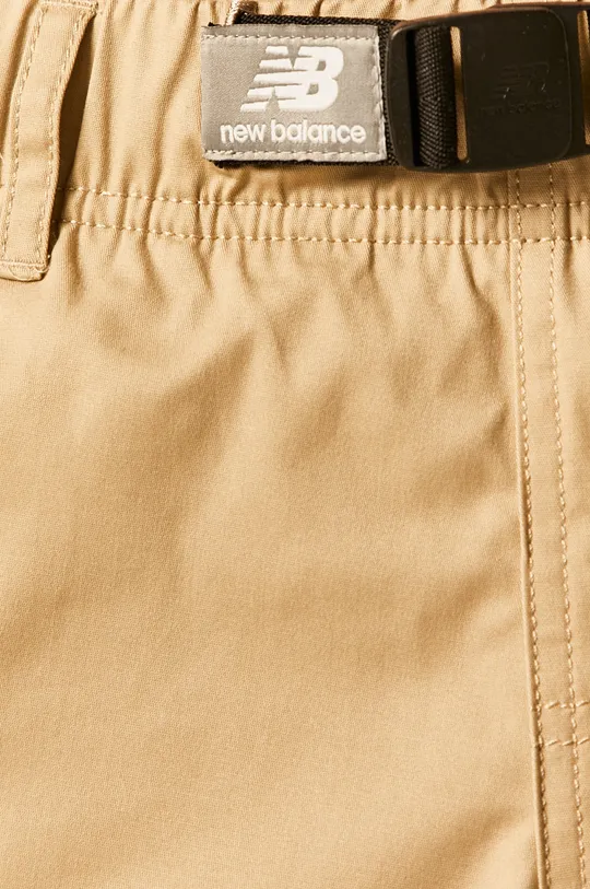 beige New Balance shorts