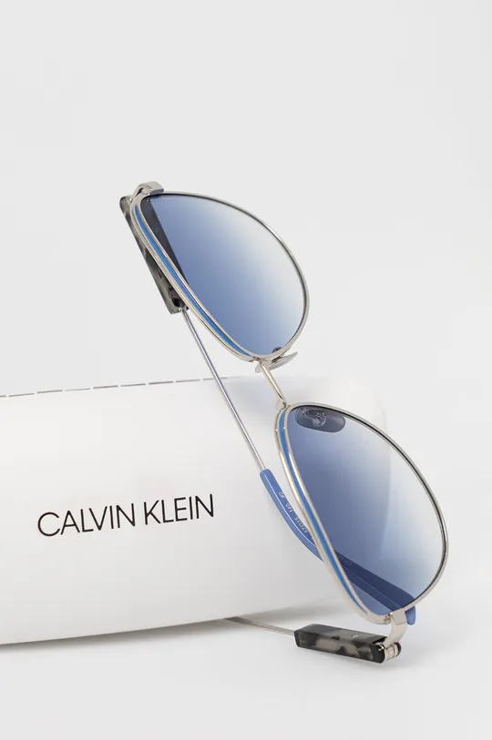 Calvin Klein - Slnečné okuliare CK18113S.39177.046  Kov