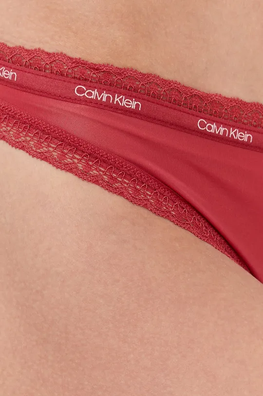 Calvin Klein Underwear Stringi Podszewka: 100 % Bawełna, Materiał zasadniczy: 15 % Elastan, 85 % Nylon, Wykończenie: 37 % Elastan, 63 % Nylon
