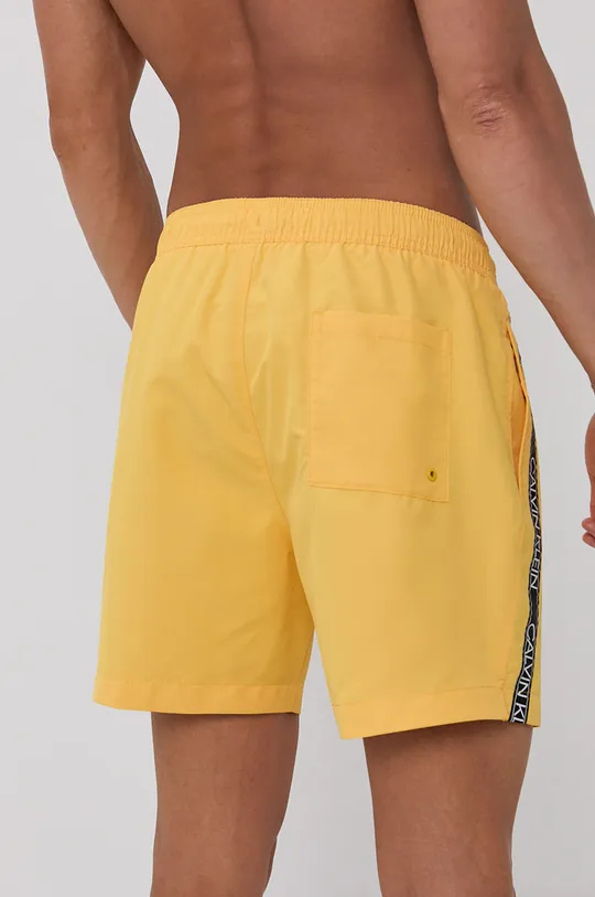 Plavkové šortky Calvin Klein žltá