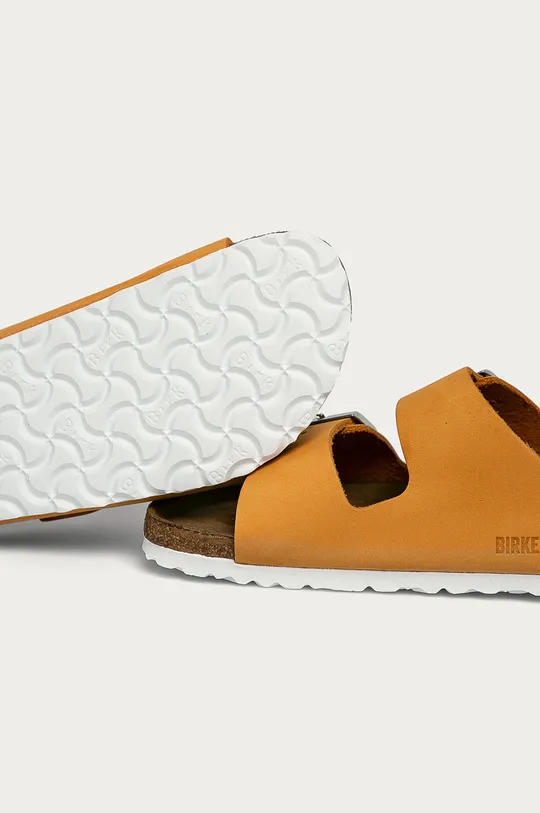 Birkenstock leather sliders Arizona  Uppers: Natural leather Inside: Suede Outsole: Synthetic material