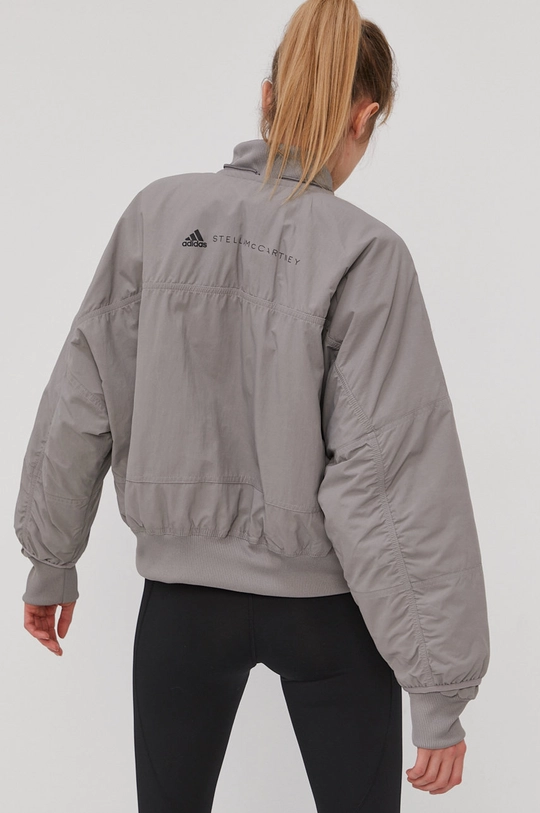 Jakna adidas by Stella McCartney  Postava: 100% Reciklirani poliester Ispuna: 10% Poliester, 90% Reciklirani poliester Temeljni materijal: 100% Reciklirani poliamid