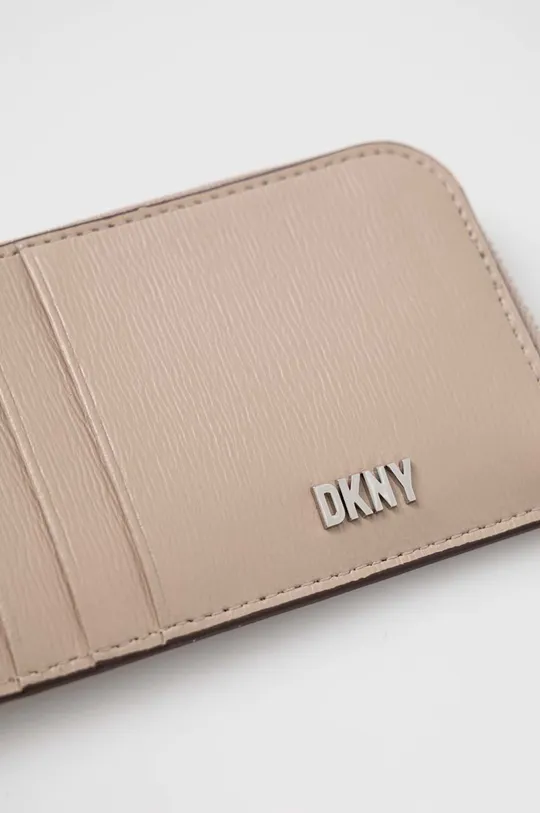 Πορτοφόλι Dkny  Κύριο υλικό: 100% Φυσικό δέρμα Φινίρισμα: 100% PVC
