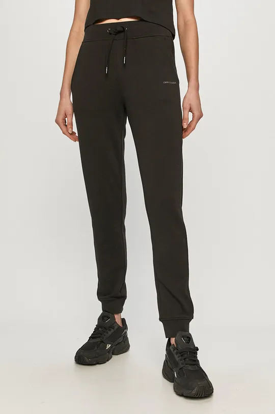 czarny Calvin Klein Jeans - Spodnie J20J215458.4891 Damski