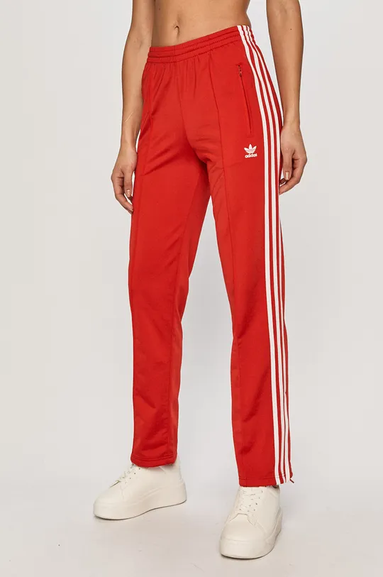 червоний adidas Originals - Штани GN2820 Жіночий