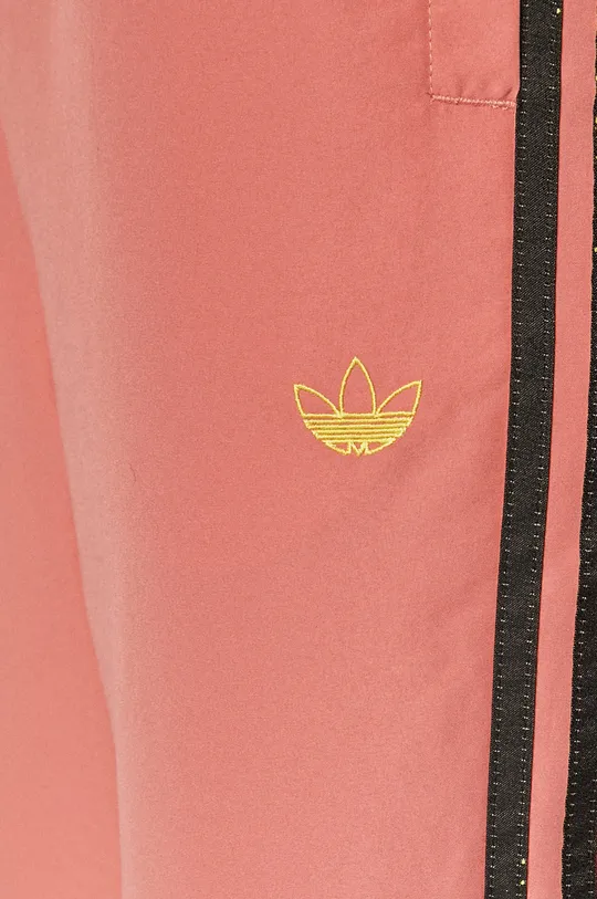рожевий adidas Originals - Штани GN4391