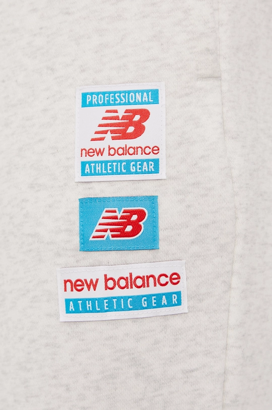 Nohavice New Balance WP11507SAH  Základná látka: 64% Bavlna, 36% Polyester