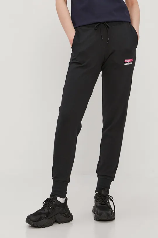 czarny New Balance Spodnie WP03806BM Damski