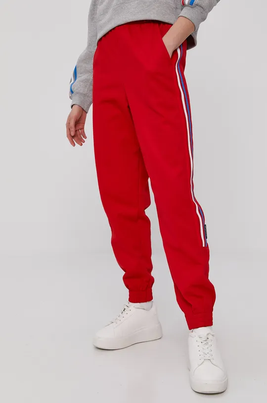 czerwony adidas Originals Spodnie GN6981 Damski