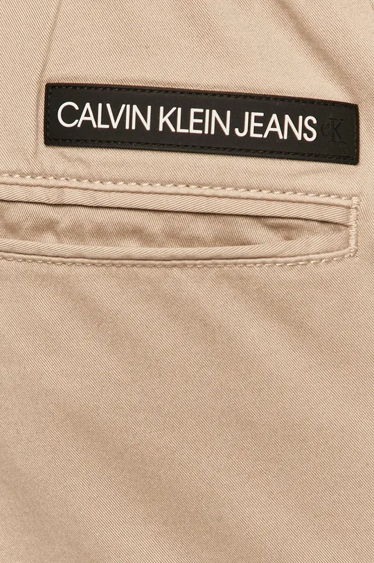 beżowy Calvin Klein Jeans - Spodnie J30J317993.4891