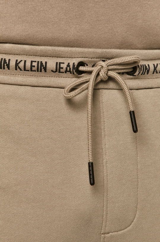 beżowy Calvin Klein Jeans - Spodnie J30J317196.4891