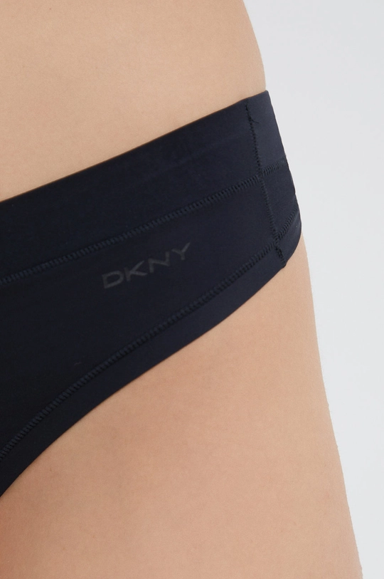 Tangá Dkny  Základná látka: 76% Nylón, 24% Spandex Vložka: 100% Bavlna