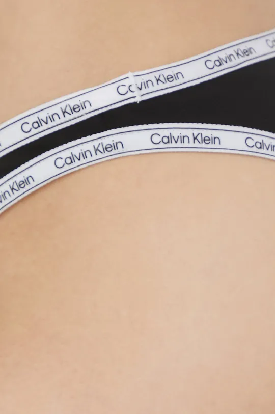 Calvin Klein figi kąpielowe  Materiał 1: 79 % Poliester, 21 % Elastan Materiał 2: 90 % Poliester, 10 % Elastan