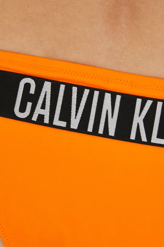 Μαγιό σλιπ μπικίνι Calvin Klein  Κύριο υλικό: 78% Πολυαμίδη, 22% Σπαντέξ Φόδρα: 92% Πολυεστέρας, 8% Σπαντέξ