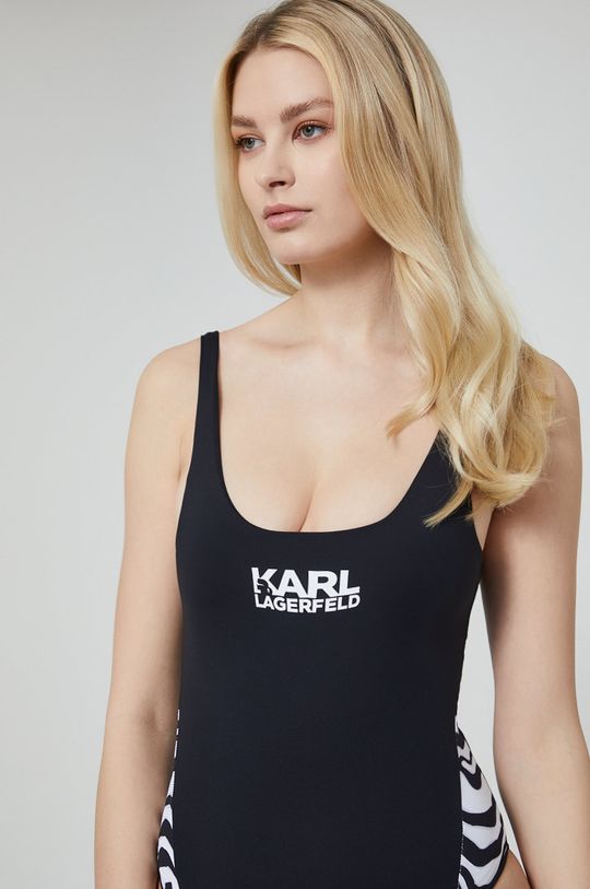 Jednodílné plavky Karl Lagerfeld  Hlavní materiál: 85 % Polyamid, 15 % Elastan Podšívka: 84 % Polyester, 16 % Elastan
