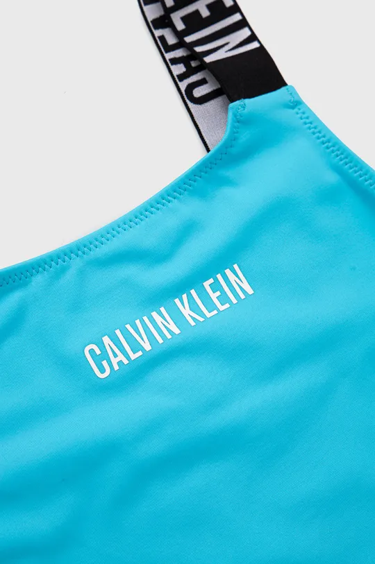 Παιδικό μαγιό Calvin Klein Jeans  Φόδρα: 8% Σπαντέξ, 92% Πολυεστέρας Κύριο υλικό: 22% Σπαντέξ, 78% Πολυαμίδη Άλλα υλικά: 14% Σπαντέξ, 86% Πολυεστέρας