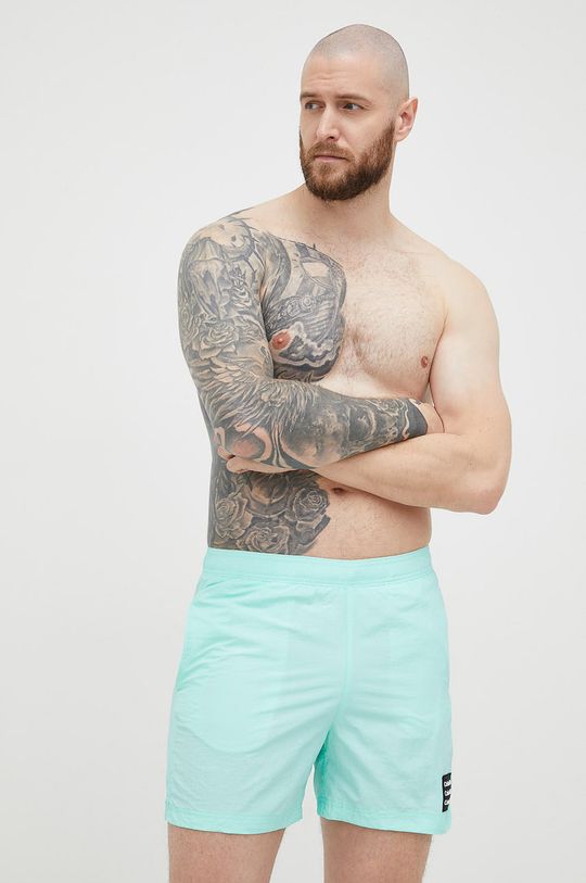 Plavkové šortky Calvin Klein svetlozelená