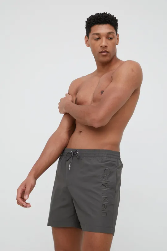 Plavkové šortky Calvin Klein sivá