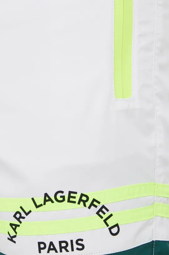 Σορτς κολύμβησης Karl Lagerfeld  Κύριο υλικό: 100% Πολυεστέρας Άλλα υλικά: 93% Πολυαμίδη, 7% Σπαντέξ