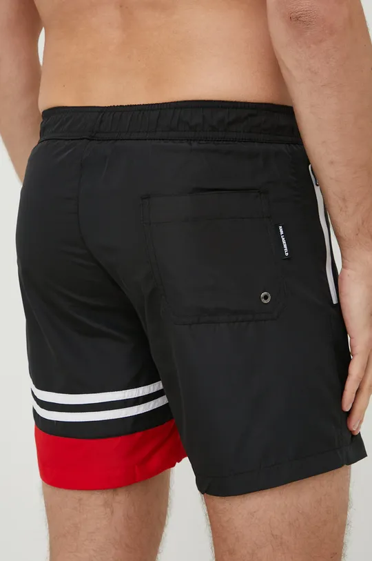 Plavkové šortky Karl Lagerfeld  Základná látka: 100 % Polyester Iné látky: 93 % Polyamid, 7 % Elastan
