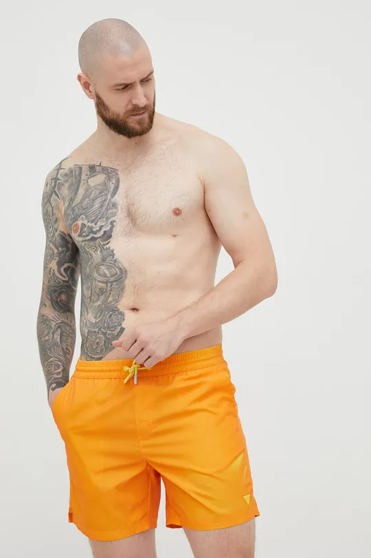 Kratke hlače za kopanje Guess oranžna