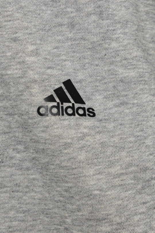 adidas Performance otroški pulover  Osnovni material: 53% Bombaž, 11% Rayon, 36% Reciklini poliester Obloga pokrova: 100% Bombaž Rebranje: 95% Bombaž, 5% Spandex