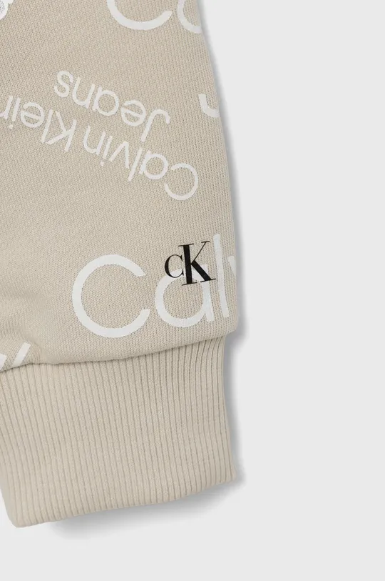 Calvin Klein Jeans bombažni pulover za otroke  Osnovni material: 100% Bombaž Rebranje: 98% Bombaž, 2% Elastane