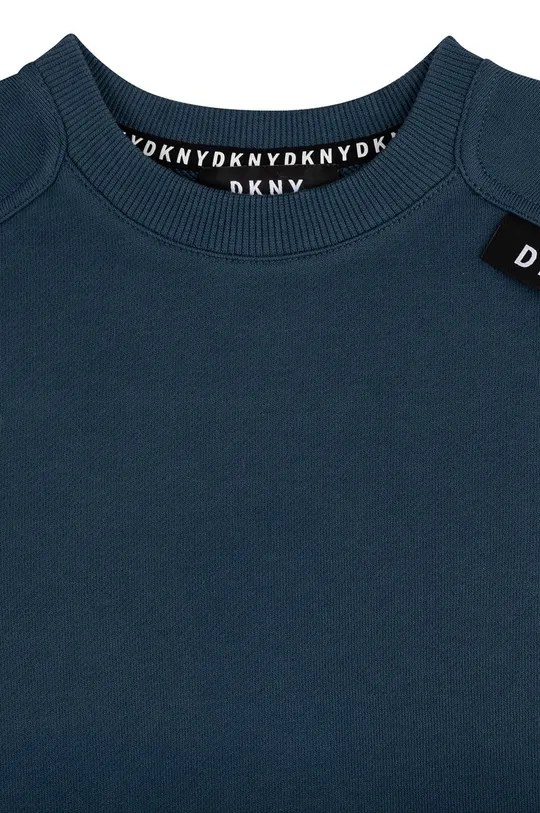 Παιδική βαμβακερή μπλούζα DKNY  Κύριο υλικό: 100% Βαμβάκι Πλέξη Λαστιχο: 95% Βαμβάκι, 5% Σπαντέξ