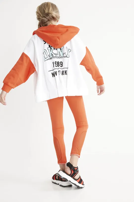 Παιδική βαμβακερή μπλούζα DKNY πορτοκαλί