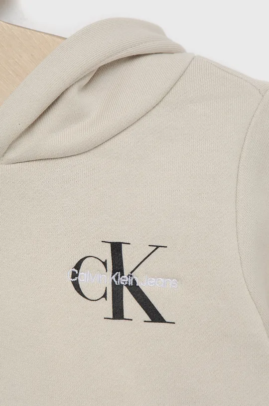 Calvin Klein Jeans - Παιδική μπλούζα  Κύριο υλικό: 100% Βαμβάκι Φόδρα κουκούλας: 100% Βαμβάκι Πλέξη Λαστιχο: 98% Βαμβάκι, 2% Σπαντέξ