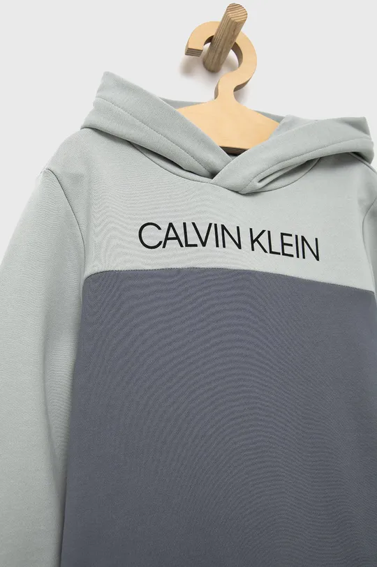 Detská bavlnená tepláková súprava Calvin Klein Jeans  Základná látka: 100% Bavlna Podšívka kapucne : 100% Bavlna Elastická manžeta: 95% Bavlna, 5% Elastan